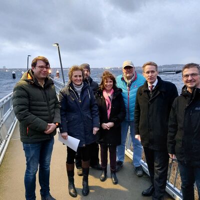 Bild vergr&ouml;&szlig;ern: Patrick Voßhall (v.l.), Hilla Mersmann, Derek Palme, Stephanie Ladwig, Peter Lehswing, Daniel Günther, Murat Birkandan.